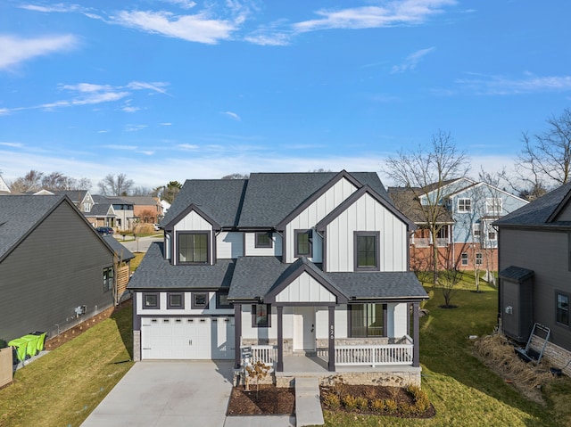 modern farmhouse style home with central AC unit, a garage, covered porch, and a front lawn