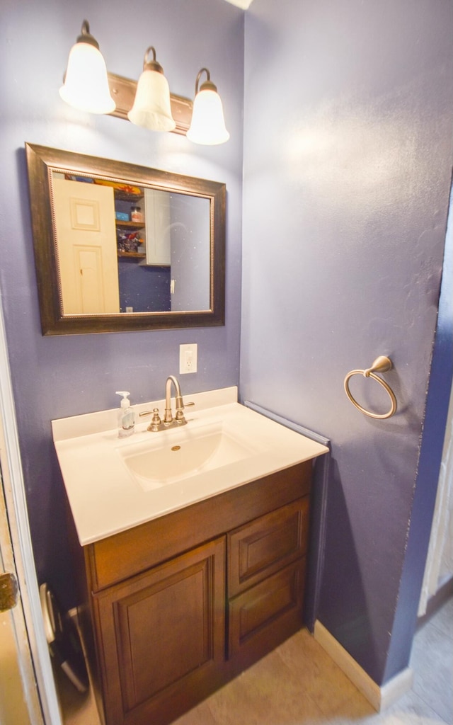 bathroom with vanity and tile patterned floors