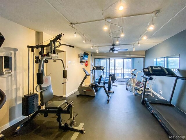 21800 Morley Ave Unit 101, Dearborn, MI 48124 - gym featuring baseboards, a ceiling fan, and rail lighting