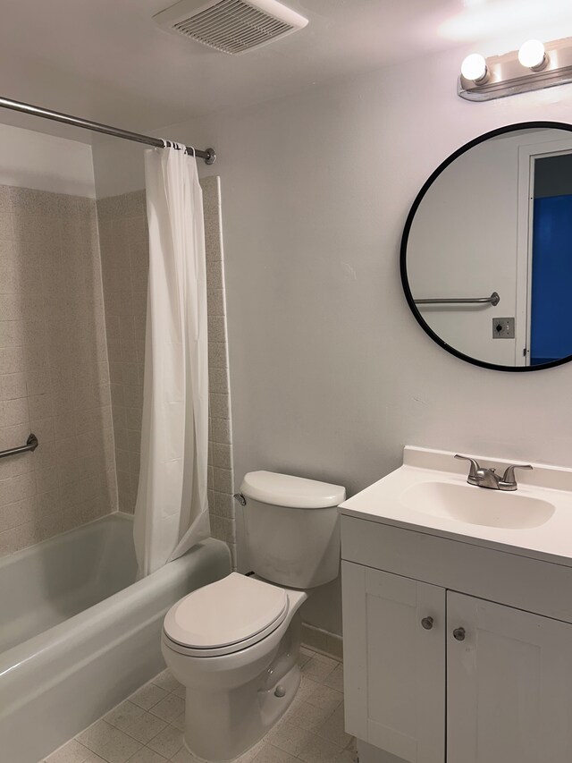 21800 Morley Ave Unit 101, Dearborn, MI 48124 - full bath featuring vanity, shower / bath combo, toilet, and tile patterned flooring