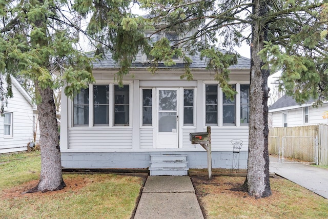 bungalow with a front lawn