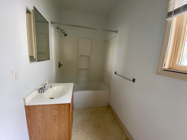 bathroom featuring vanity and shower / bathtub combination