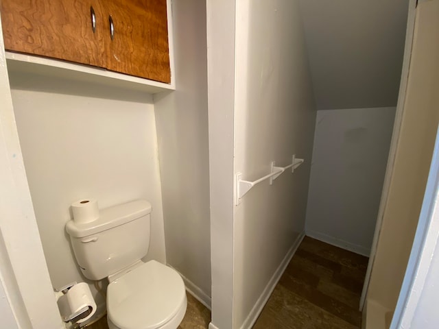 bathroom featuring hardwood / wood-style floors and toilet