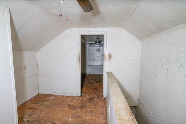 bonus room with ceiling fan and vaulted ceiling