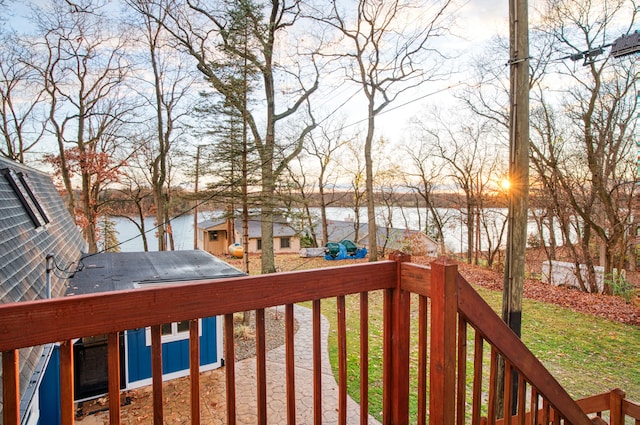 wooden deck with a water view