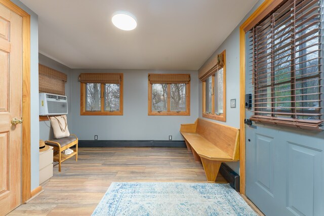 mudroom featuring light hardwood / wood-style floors and cooling unit