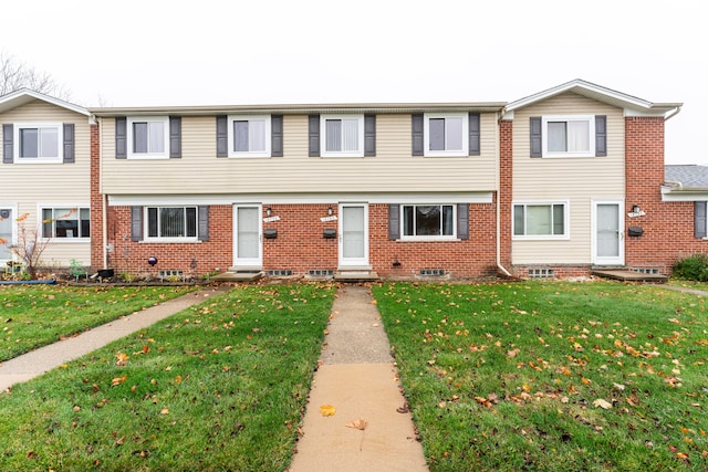 view of front of house with a front lawn