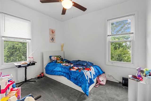 carpeted bedroom with ceiling fan