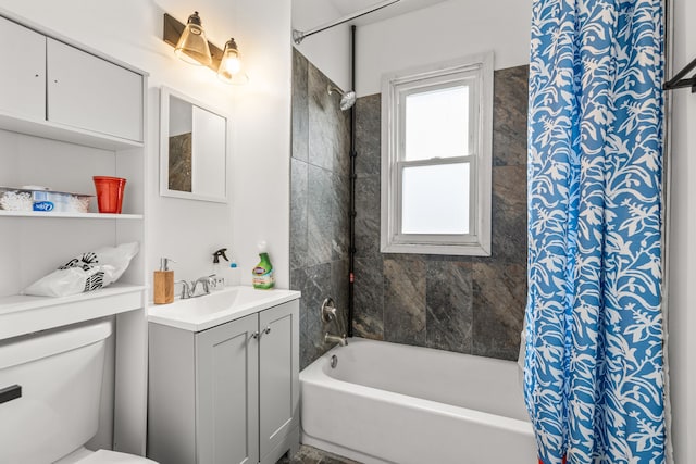 full bathroom with vanity, toilet, and shower / bathtub combination with curtain