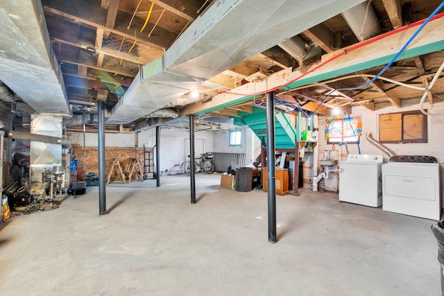 basement featuring washing machine and dryer