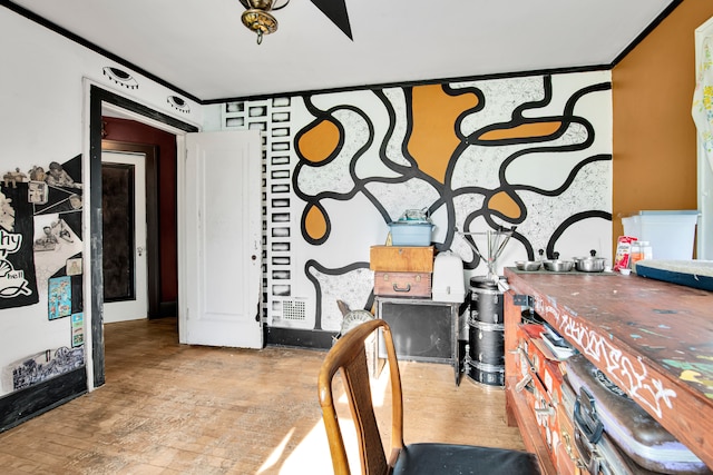 dining area featuring crown molding and light hardwood / wood-style flooring