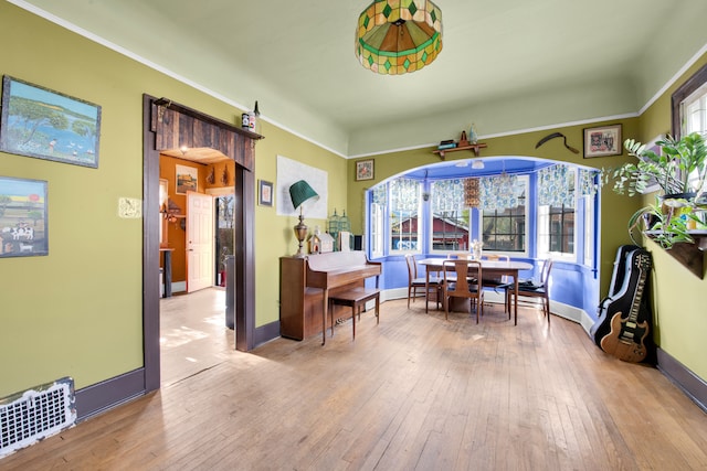 dining space with light wood-type flooring