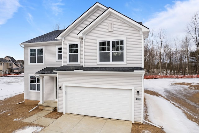 front of property featuring a garage