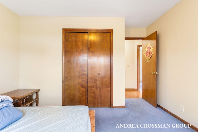 carpeted bedroom with a closet