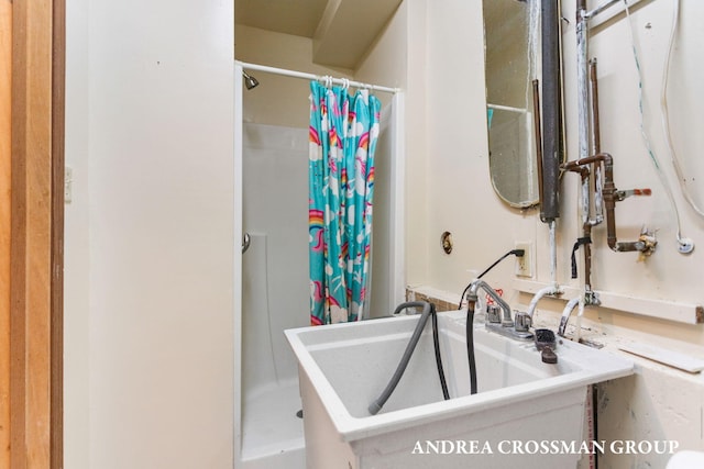 bathroom featuring sink and walk in shower