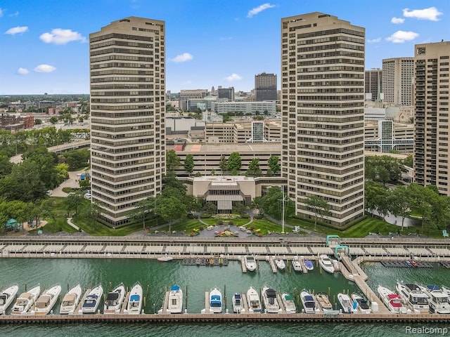 property's view of city with a water view