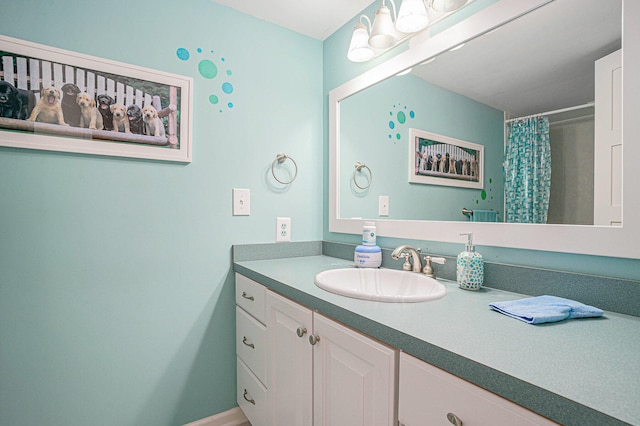 bathroom with a shower with curtain and vanity