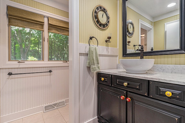 bathroom featuring tile patterned floors and vanity