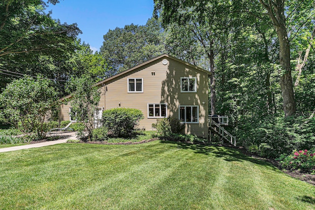 view of front of home with a front lawn