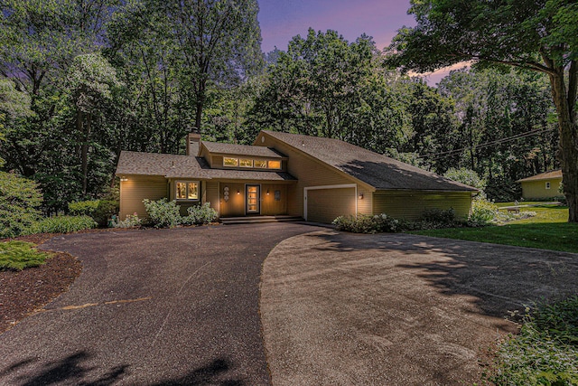 view of front of property featuring a garage