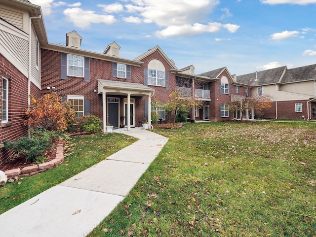 view of front of property with a front lawn