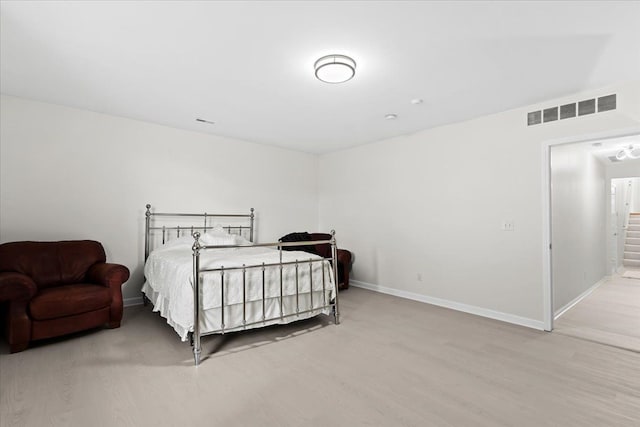 bedroom featuring light hardwood / wood-style floors