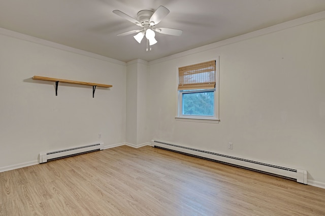 empty room featuring baseboard heating, ornamental molding, and light wood-type flooring