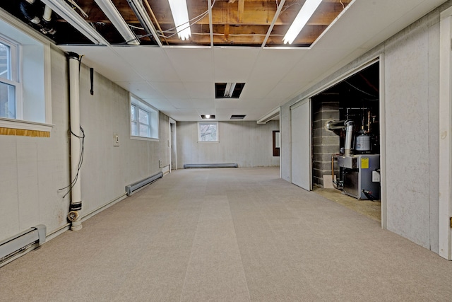 basement featuring a baseboard radiator