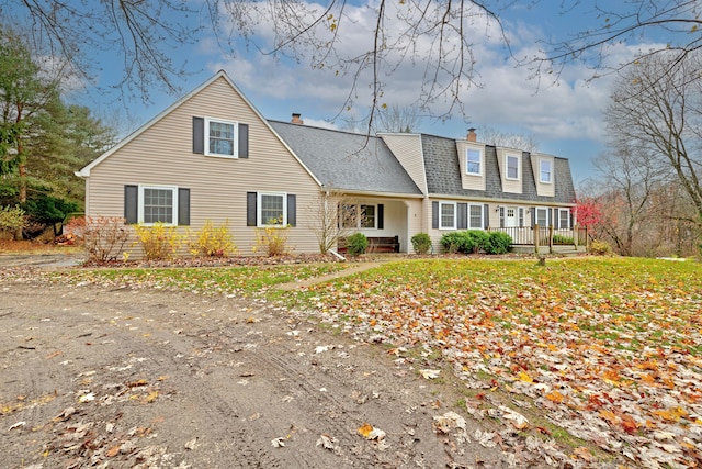 cape cod home with covered porch