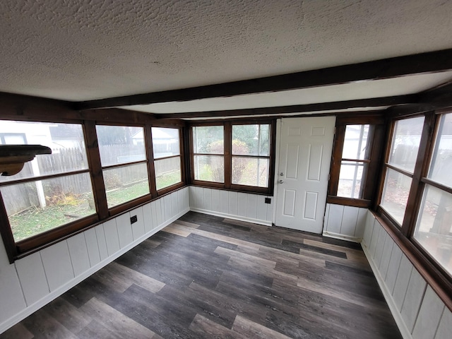 20501 Elkhart St, Harper Woods, MI 48225 - unfurnished sunroom featuring a textured ceiling, beam ceiling, wood finished floors, and a decorative wall