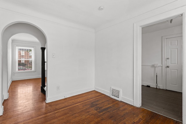 empty room featuring dark hardwood / wood-style floors