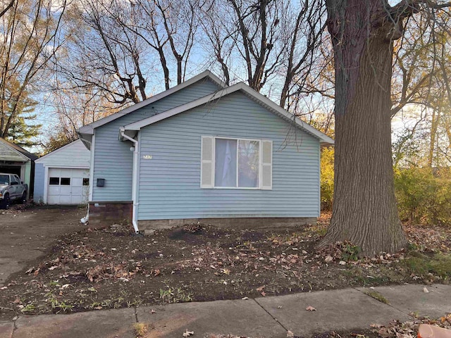 view of side of property featuring a garage