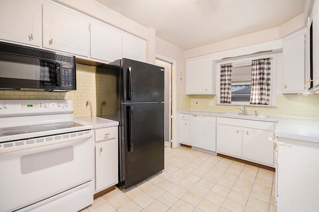 kitchen with tasteful backsplash, light tile patterned flooring, white cabinets, and black appliances