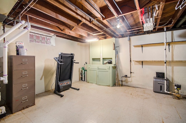 basement with tile patterned floors