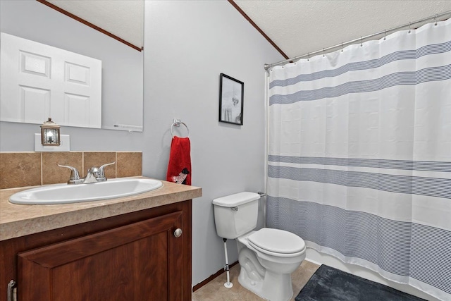 bathroom with lofted ceiling, crown molding, a textured ceiling, and toilet