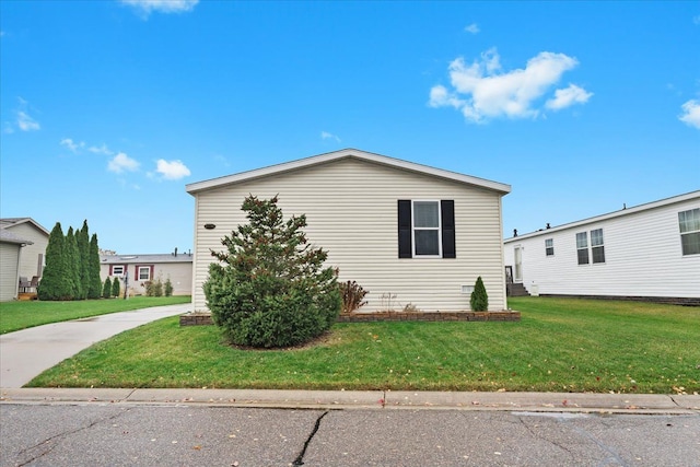 view of property exterior featuring a yard