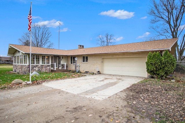 single story home featuring a garage