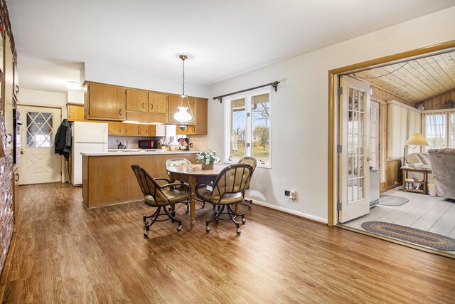 7349 E Main St, Eau Claire, MI 49111 - dining area with light wood finished floors and baseboards