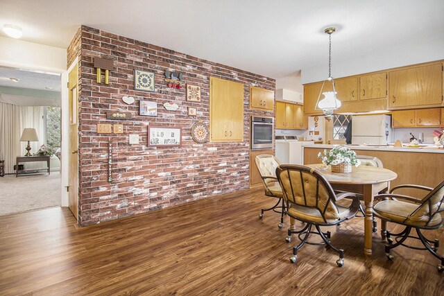 7349 E Main St, Eau Claire, MI 49111 - dining space with brick wall and wood finished floors