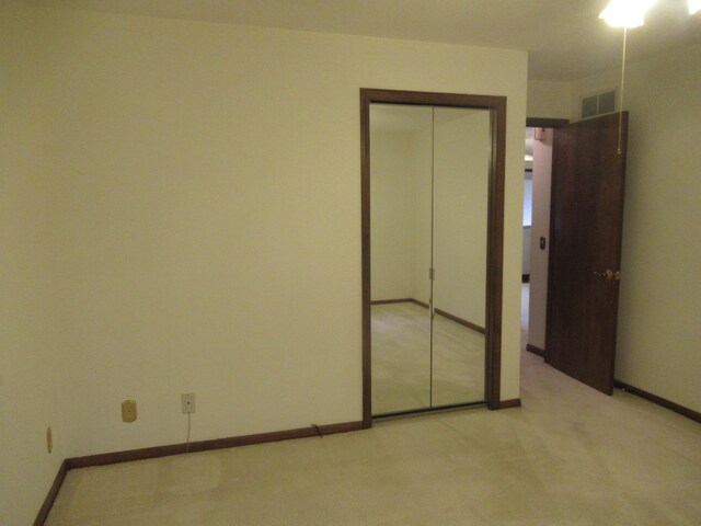 unfurnished bedroom with a closet