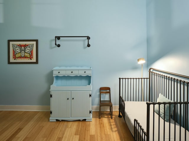 bedroom with light hardwood / wood-style floors