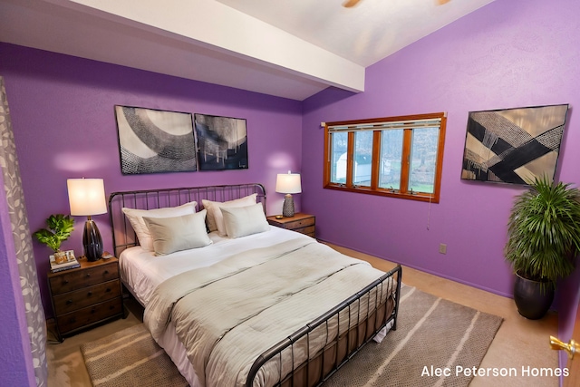 bedroom featuring vaulted ceiling with beams and carpet floors