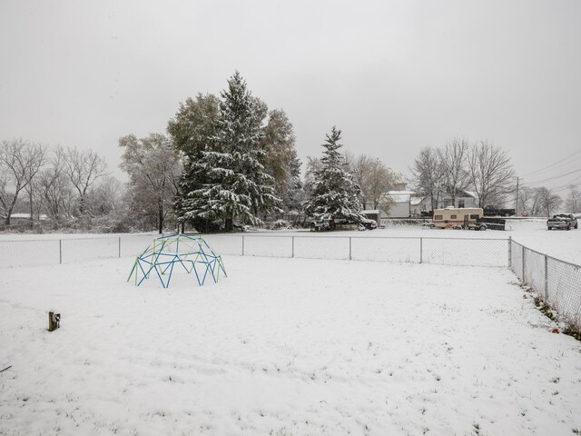 view of yard covered in snow