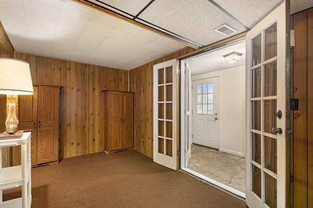 1806 Bond St, Niles, MI 49120 - carpeted empty room featuring wood walls