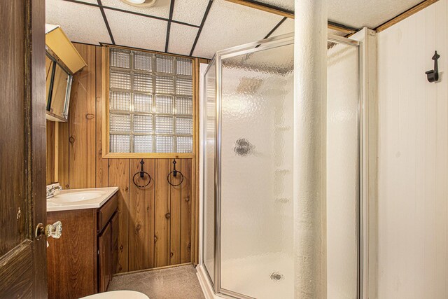 1806 Bond St, Niles, MI 49120 - full bath featuring a stall shower, wooden walls, vanity, and toilet
