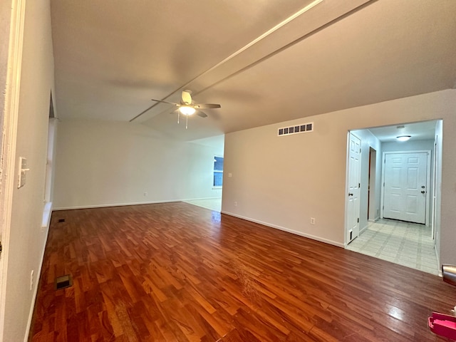 spare room featuring light hardwood / wood-style floors and ceiling fan