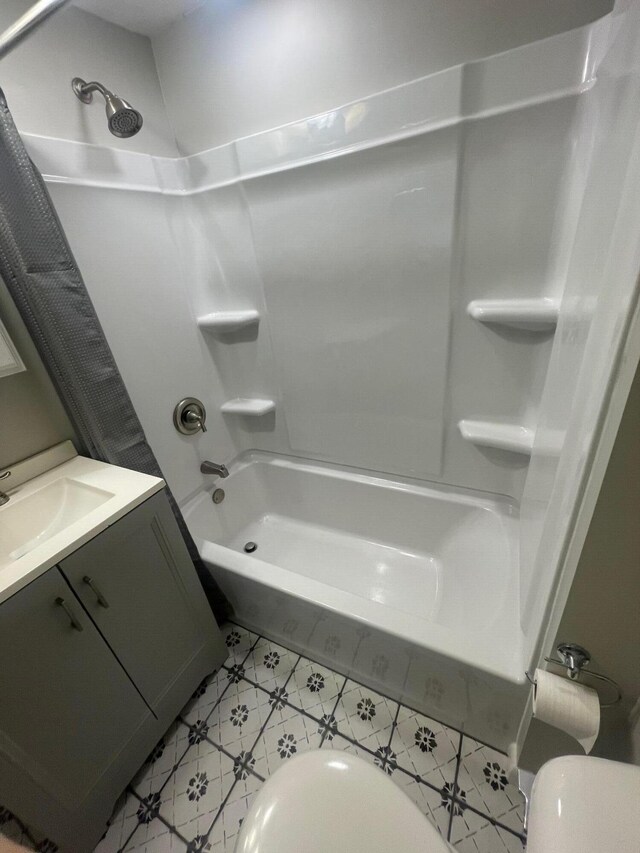 318 N Grand St, Schoolcraft, MI 49087 - bathroom with shower / bath combo, toilet, and vanity