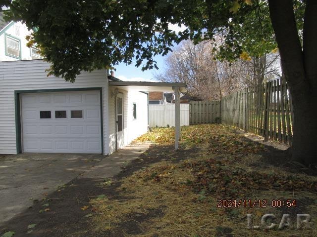 exterior space with a garage