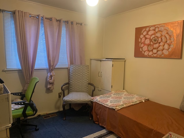 carpeted bedroom featuring ornamental molding