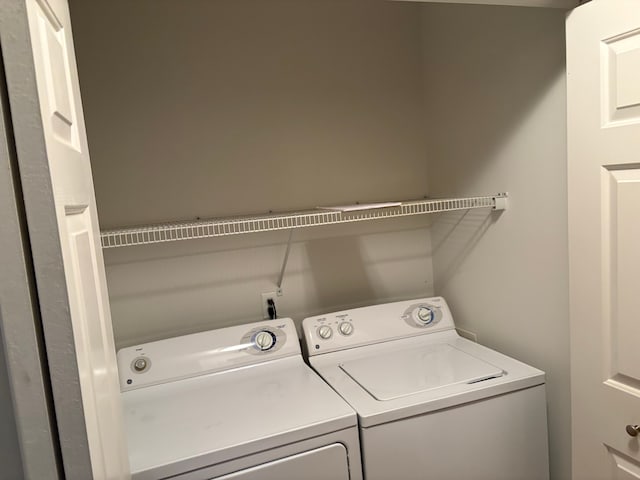 laundry area with washer and clothes dryer